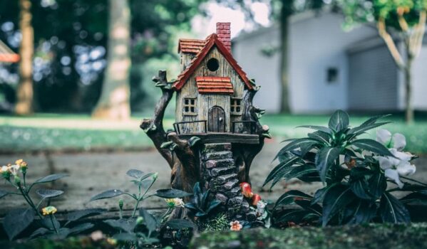 Tiny birdhouse in a garden